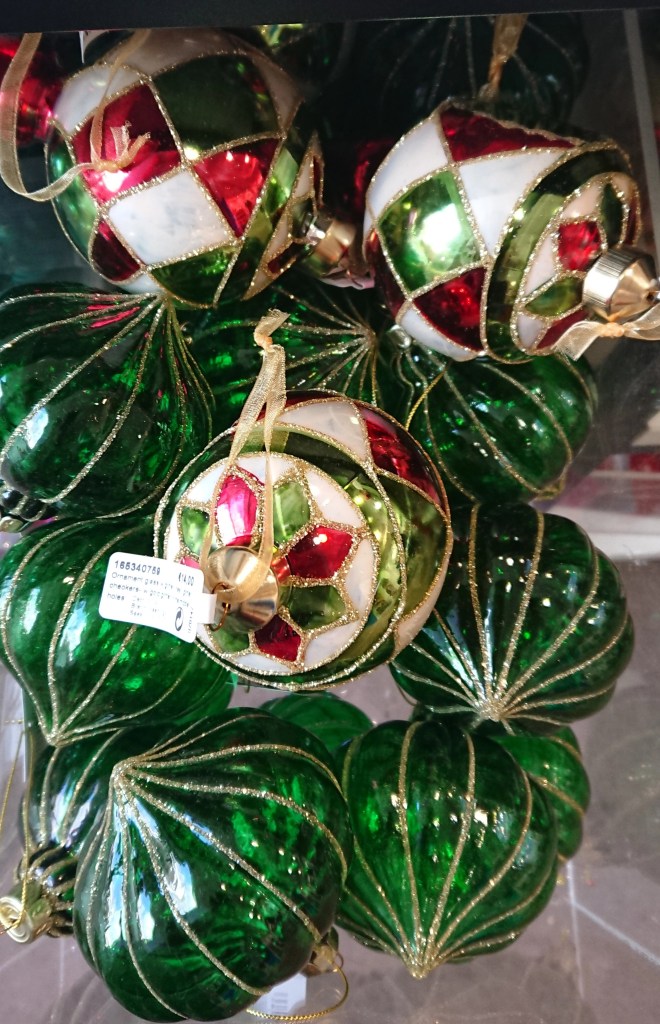 Green and red decorations from the Timeless Treasures Collection in Brown Thomas.