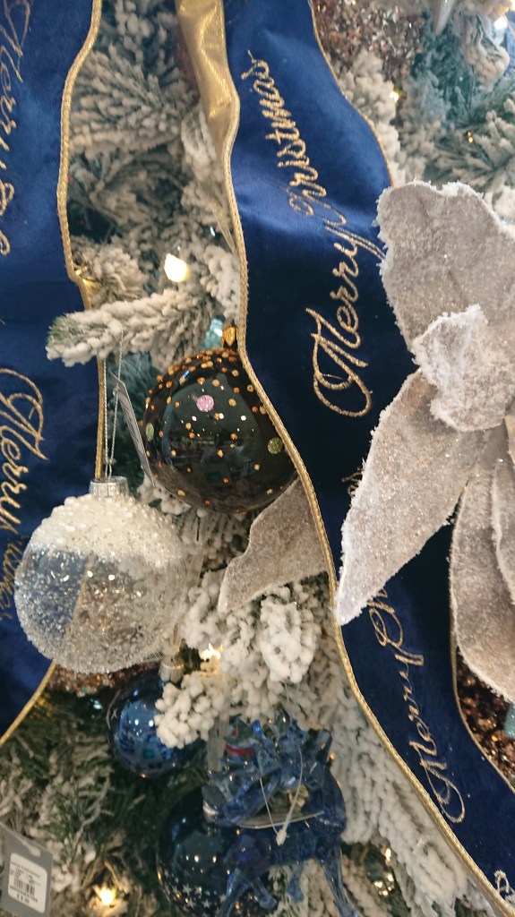 Glass baubles and bows on Midnight Magic Theme Tree